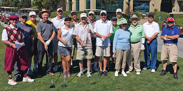 Golf tournament participants